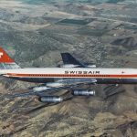 Swissair, Convair-Coronado 990 im Flug über Green Acres, Riversi